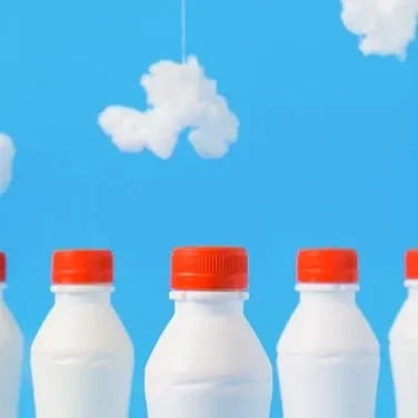 three milk bottles